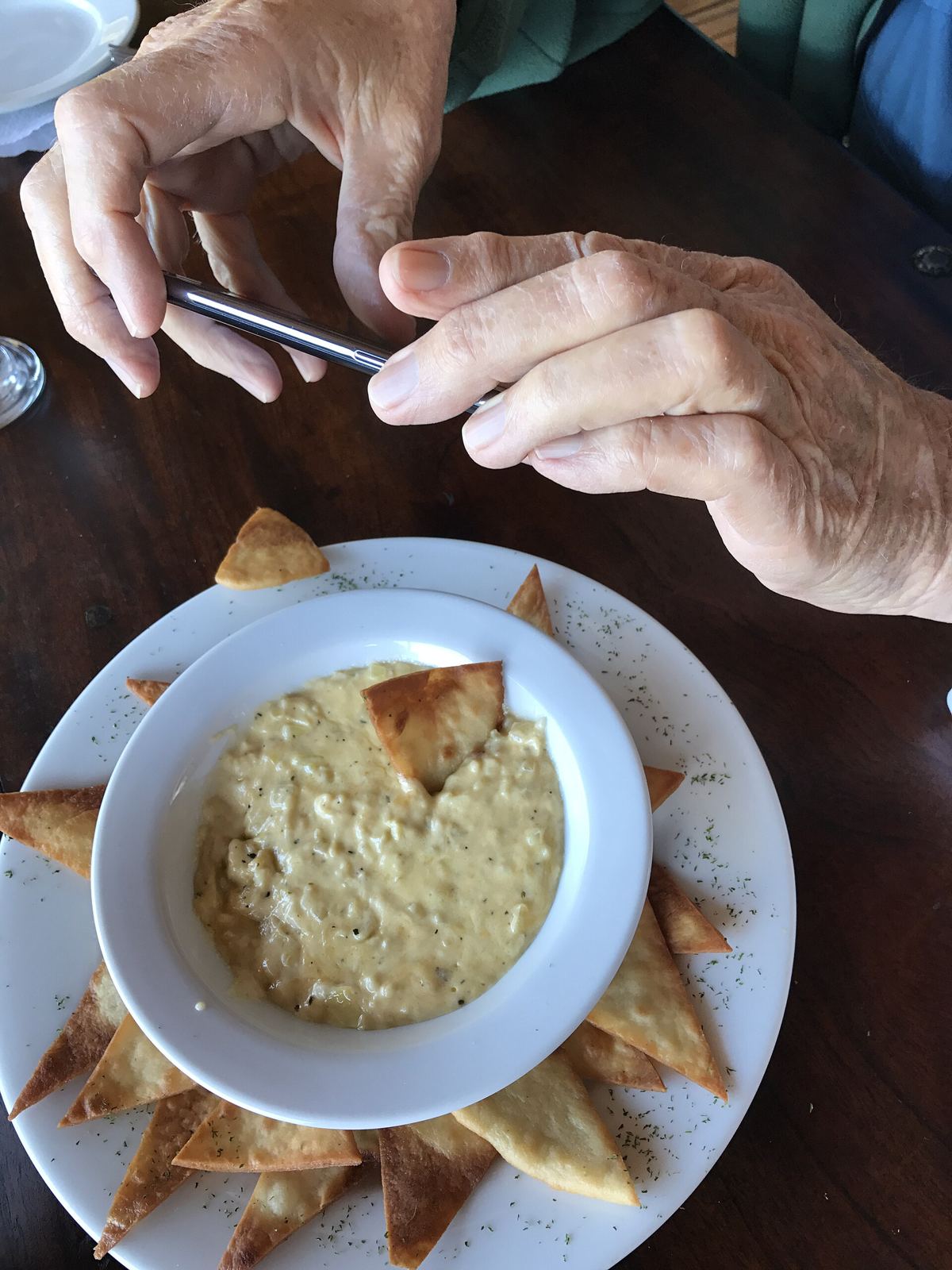 Creator photographing a dish